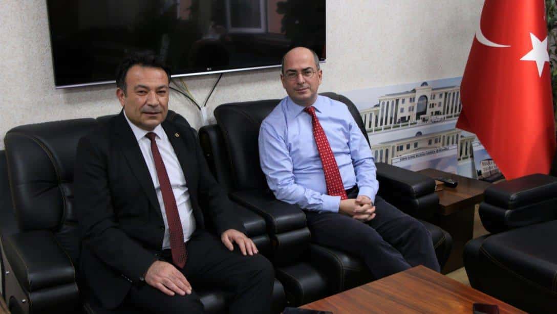 Abdullah Gül Üniversitesi Rektör Yardımcısı Sayın Prof. Dr. Erk Hacıhasanoğlu İl Millî Eğitim Müdürümüz Sayın Bahameddin Karaköse'ye hayırlı olsun ziyaretinde bulundu.