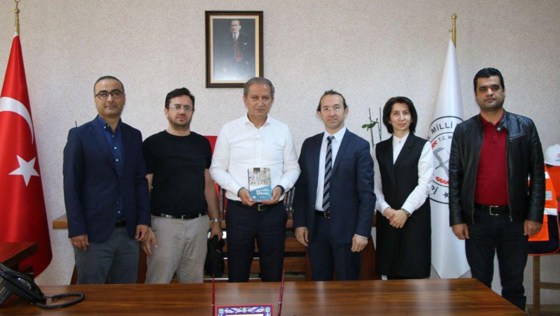 TÜZDEV Kayseri Şubesi Başkanı Fatih Duman ve Yönetim Kurulu, İl Milli Eğitim Müdürümüz Sayın Celattein Ekinci'yi Makamında Ziyaret Etti.