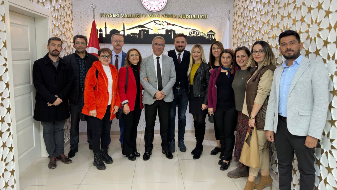 Mustafa Eraslan Lisesi öğretmenleri, İl Millî Eğitim Müdürümüz Sayın Ayhan Teltik'i makamında ziyaret ettiler
